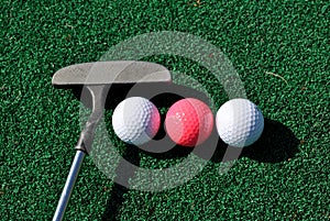 Putter and balls photo