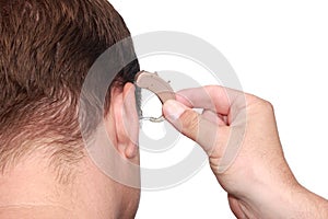 Puttin on a hearing aid