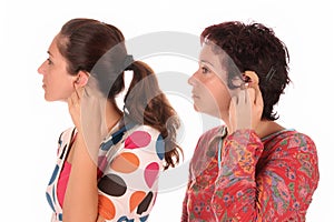 Putting hearing aid into ear