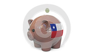 Putting money into piggy bank with flag of Chile. Tax system system or savings related conceptual 3D animation