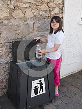 Putting rubbish in the bin