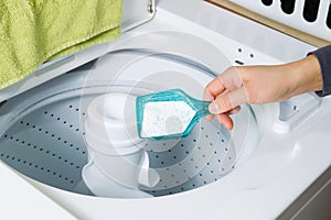 Putting Soap into washing machine