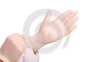 Putting on white protective Glove