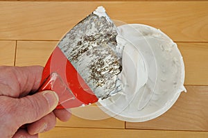 Putty Knife with Spackling Paste photo
