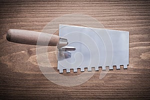 Putty spattle with wooden handle