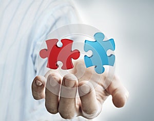 Puzzle in the hand of businessman