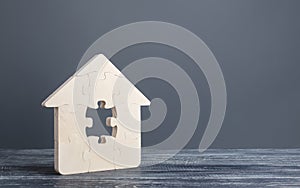 Puzzle house with a missing piece. Purchase or construction comfortable dream home. Mortgage loan purchase real estate.