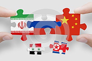 Puzzle made from flags of Iran,Russia, and China, Syria, North Korea.