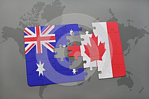 puzzle with the national flag of australia and canada on a world map background.