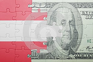 Puzzle with the national flag of austria and dollar banknote