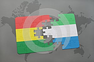 puzzle with the national flag of bolivia and sierra leone on a world map