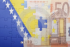 Puzzle with the national flag of bosnia and herzegovina and euro banknote