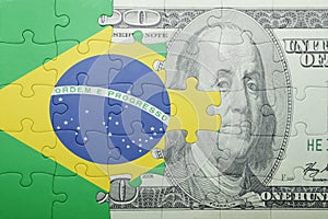 Puzzle with the national flag of brazil and dollar banknote