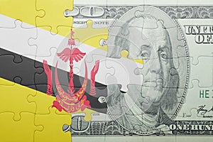 Puzzle with the national flag of brunei and dollar banknote