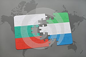 puzzle with the national flag of bulgaria and sierra leone on a world map