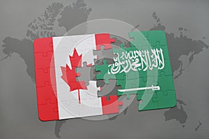 puzzle with the national flag of canada and saudi arabia on a world map background.