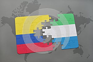 puzzle with the national flag of colombia and sierra leone on a world map