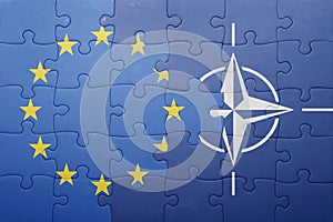 Puzzle with the national flag of european union and nato photo