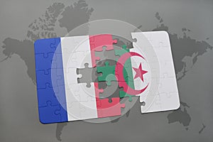 puzzle with the national flag of france and algeria on a world map background.