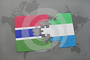 puzzle with the national flag of gambia and sierra leone on a world map