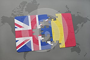 puzzle with the national flag of great britain and romania on a world map background