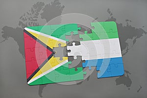 puzzle with the national flag of guyana and sierra leone on a world map