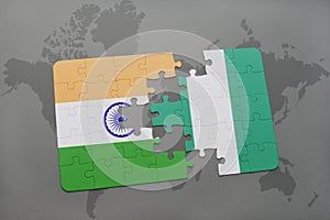 puzzle with the national flag of india and nigeria on a world map background.