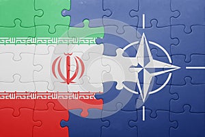 Puzzle with the national flag of iran and nato