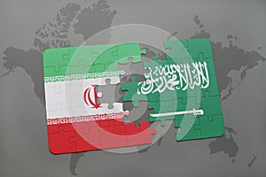 puzzle with the national flag of iran and saudi arabia on a world map background.