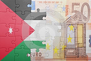 Puzzle with the national flag of jordan and euro banknote