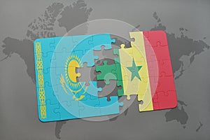 puzzle with the national flag of kazakhstan and senegal on a world map