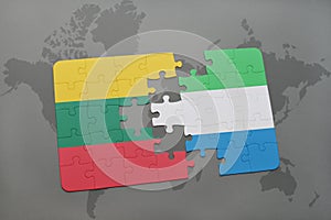 puzzle with the national flag of lithuania and sierra leone on a world map