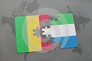 puzzle with the national flag of mali and sierra leone on a world map