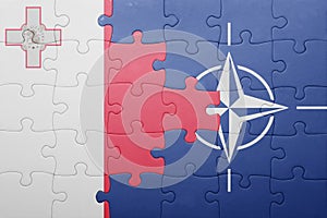 Puzzle with the national flag of malta and nato