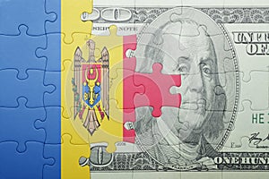 Puzzle with the national flag of moldova and dollar banknote