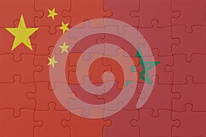 puzzle with the national flag of morocco and china . macro.concept