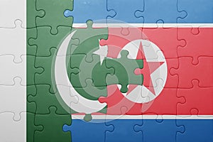 Puzzle with the national flag of north korea and pakistan