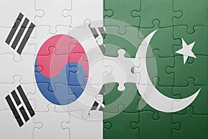 Puzzle with the national flag of pakistan and south korea