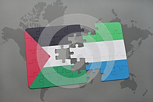 puzzle with the national flag of palestine and sierra leone on a world map