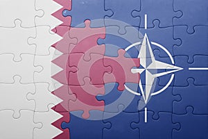 Puzzle with the national flag of qatar and nato