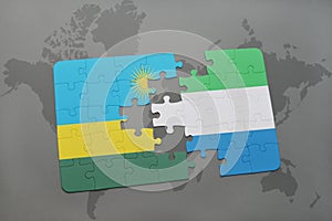 puzzle with the national flag of rwanda and sierra leone on a world map
