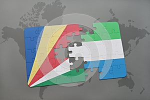puzzle with the national flag of seychelles and sierra leone on a world map