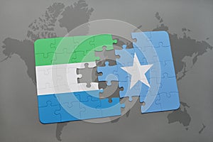 puzzle with the national flag of sierra leone and somalia on a world map