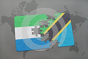 puzzle with the national flag of sierra leone and tanzania on a world map