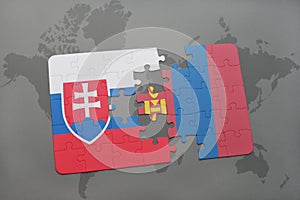 Puzzle with the national flag of slovakia and mongolia on a world map