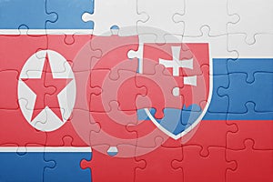 Puzzle se státní vlajkou slovenska a severní koreje