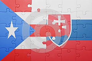 Puzzle se státní vlajkou slovenska a Portorika