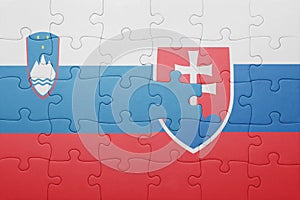 Puzzle se státní vlajkou slovenska a slovinska