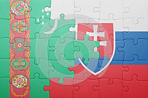 Puzzle with the national flag of slovakia and turkmenistan