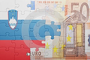 Puzzle with the national flag of slovenia and euro banknote